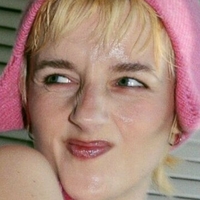 Грета Айзък Голи