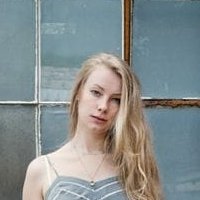 Нора Куест Голи